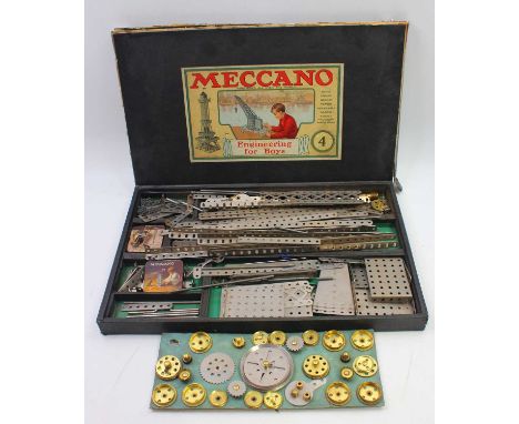 Meccano outfit no.4, comprising nickel components, mostly unstrung, in very good condition, box base is good, box lid is poor
