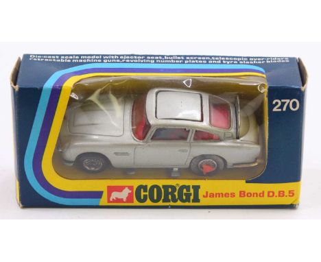 A Corgi Toys No. 270 James Bond Aston Martin DB5 comprising a silver body with red interior and driver figure, missing bandit