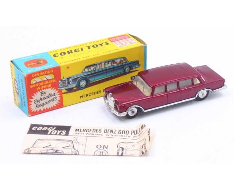 Corgi Toys No. 247 Mercedes Benz 600 Pullman comprising of metallic red body with cream interior and spun hubs housed in the 