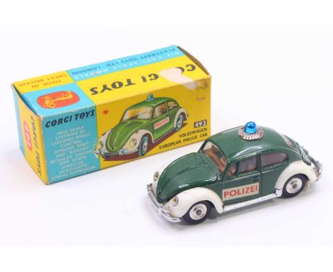 Corgi Toys No. 492 Volkswagen European police car comprising of a dark green and white body with blue roof light and two pass