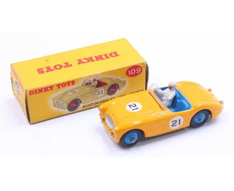 Dinky Toys No. 109 Austin Healey 100 sports car comprising yellow body with blue interior and racing No. 21 housed in the ori