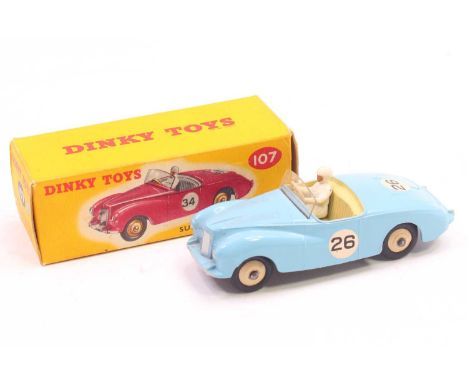 Dinky Toys, 107 Sunbeam Alpine Sports, pale blue body with cream interior and cream rigid hubs, white driver with windscreen,
