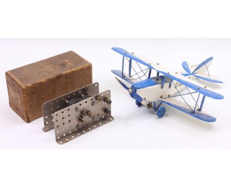 Believed to be totally repainted Meccano made up constructor plane, single engine biplane, in blue and white, G-BERQ, togethe