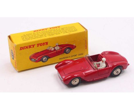 French Dinky Toys No. 22A Maserati Sport 2000 race car comprising of red body with spun hubs and white driver figure, with or