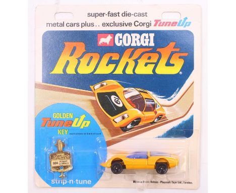 Corgi Toys Rockets D904 Porsche Carrera 6 Racing Car - Yellow, red bonnet, blue windows and racing No.19 with key, on origina