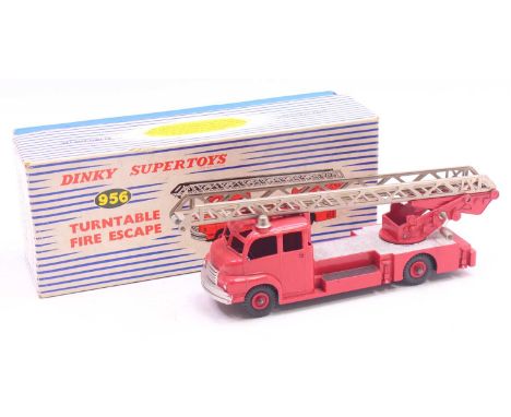 Dinky Toys No. 956 turntable fire escape engine with windows comprising red and silver body with red plastic hubs with chrome