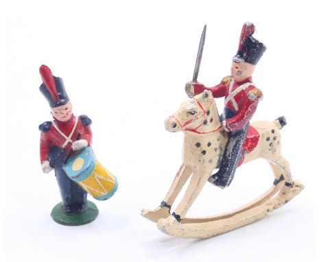 Wendall Lead and Hollow Painted figure of a Rocking Horse and a Rider Figure, together with another drummer soldier figure, a