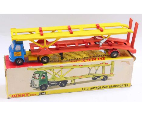 Dinky Toys No. 974 AEC Hoynor car transporter comprising metallic blue cab and yellow chassis with yellow and orange trailer,