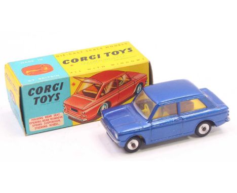 Corgi Toys No. 251 Hillman Imp comprising of dark metallic blue body with yellow interior and luggage piece included with spu