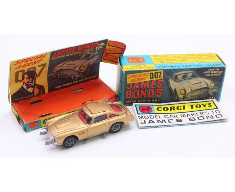 Corgi Toys No. 261 James Bond Aston Martin DB5 comprising of gold body with red interior, and cast wire work hubs, all mechan