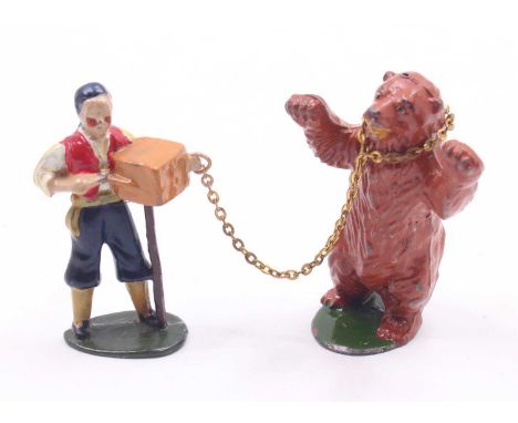 Timpo Lead and hollow painted figures of a Dancing Bear with an Organ Grinder Figure and chain, Loose examples