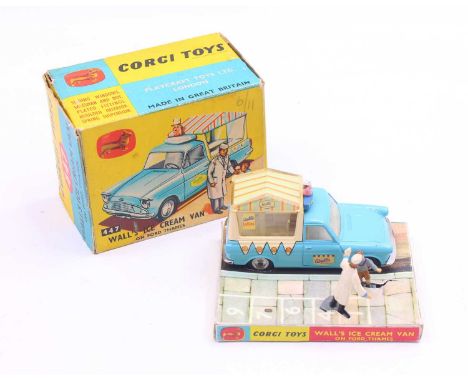 Corgi Toys No. 447 Walls Ice Cream van, comprising of a light blue body with spun hubs with an ice cream man vendor figure an