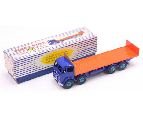 Dinky Toys No. 903 Foden flat truck with tailboard comprising of 2nd type dark blue cab and chassis with dark orange back and