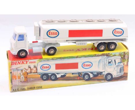 Dinky Toys No. 945 AEC fuel tanker Esso comprising all-white body with chromed domed hubs, complete with grey filler caps, ho