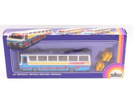 Siku No.3417 MAN Coach, silver, blue body with red interior, housed in the original window box (NM-BVG)