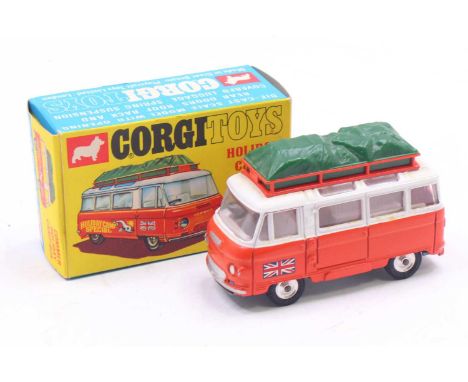 Corgi Toys No. 508 Commer Holiday Camp bus comprising of an orange and white body, with green roof luggage load, with suitcas
