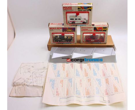 An orignal Corgi Tronics plastic vac formed shop display model, comprising of a silver plastic base to read Electronic Corgi 