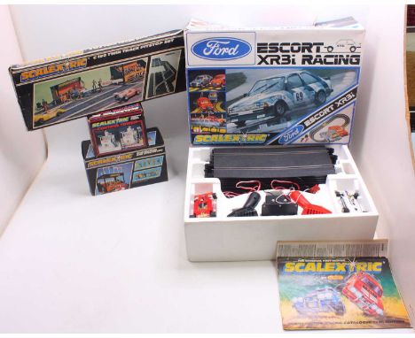 Scalextric group of 4 sets and accessories to include; Ford Escort XRBI Racing set, a Control Tower, C190 Twin Track Pitstop 