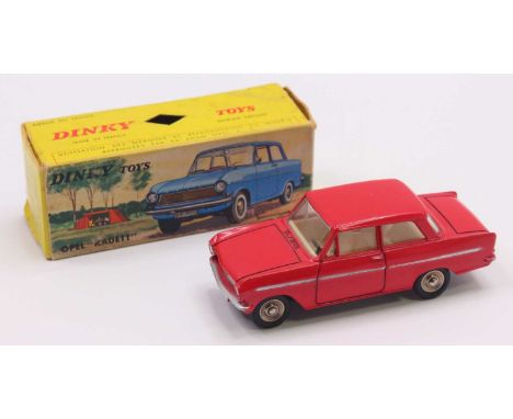 French Dinky Toys No. 540 Opel Kadett comprising red body, cream interior with flat spun hubs, housed in the original picture