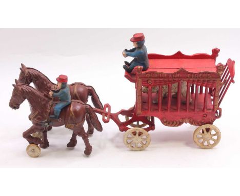 Vintage Hubley Toys? Cast Iron Overland Circus Set containing 2 horses cage with a Bear and 2 figures