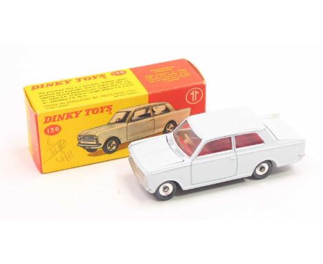 Dinky Toys No.136 Vauxhall Viva Saloon comprising white body with red interior and spun hubs, in the original red &amp; yello