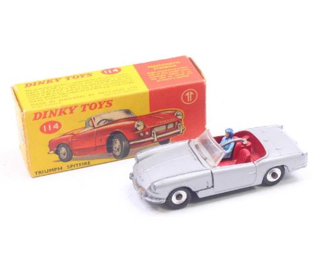 Dinky Toys No.114 Triumph Spitfire saloon comprising of silver body with red interior, spun hubs and driver figure, housed in
