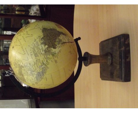 Globe on wooden base