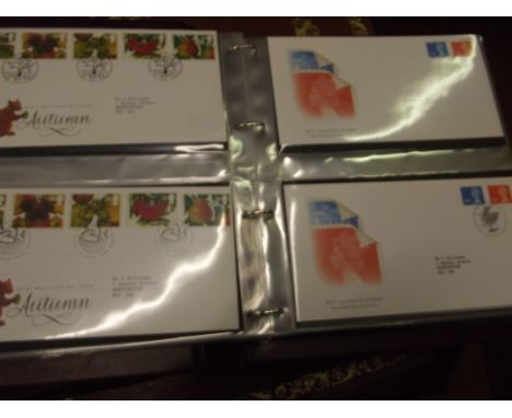 Album containing First Day Covers