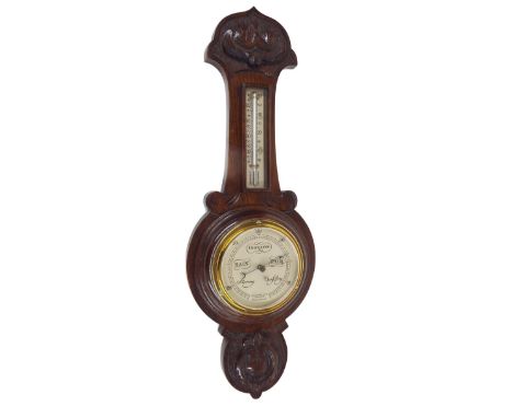 Small oak barometer/thermometer, the 5" silvered dial signed John Barker &amp; Co Limited, Kensington, within a turned surrou