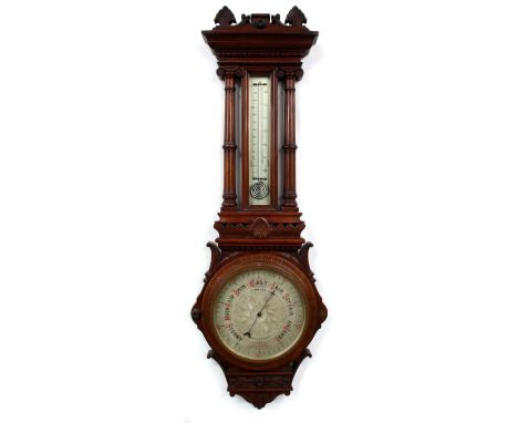 Large impressive walnut barometer/thermometer, the 9.5" silvered dial signed J. Daniels, Maker, Clerkenwell with geometric fl