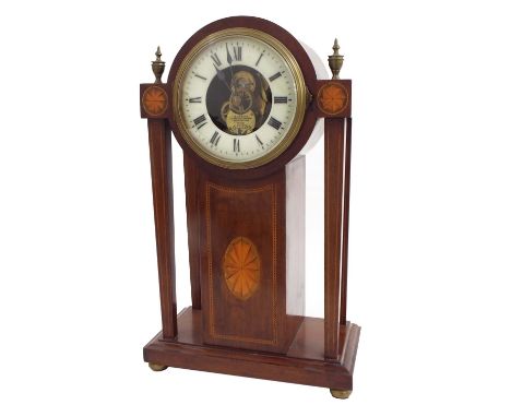 Eureka electric mantel clock, the 4.25" cream chapter ring enclosing a skeletonised centre inscribed on the fast/slow plate E