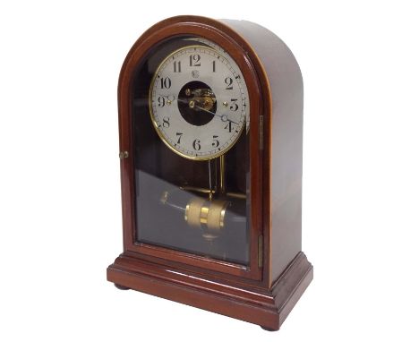 Bulle mahogany electric mantel clock, the 4.5" silvered dial with skeletonised centre, within a bevelled glazed stepped round