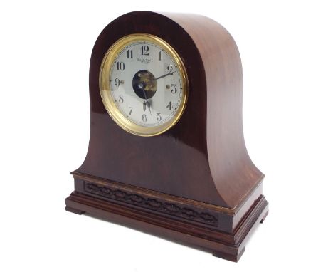 French mahogany electric mantel clock, the 4.5" silvered dial with skeletonised centre signed Bulle-Clock..., within a rounde