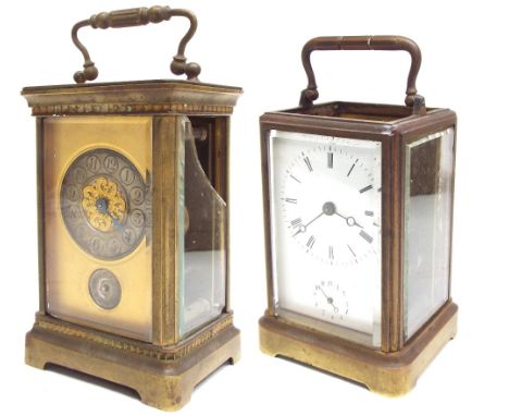 Carriage clock with alarm and striking on a bell, within a corniche brass case, 5.75" high, also with outer travelling Morocc