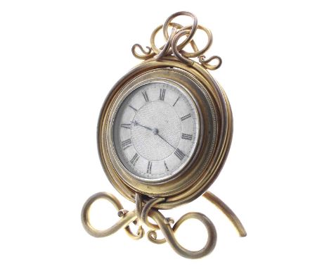 Small ormolu easel desk clock timepiece in the manner of Thomas Cole, the 2.5" silvered chapter ring enclosing an engine turn
