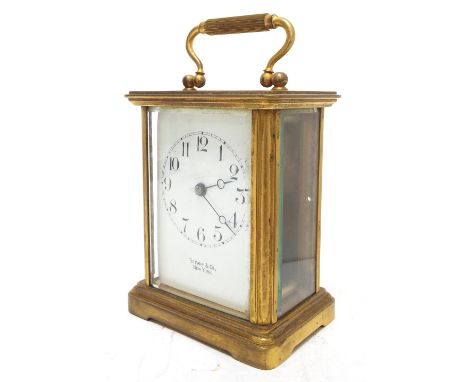 Unusual carriage clock timepiece signed Tiffany &amp; Co. New York on the dial plate, the back plate with visible platform es