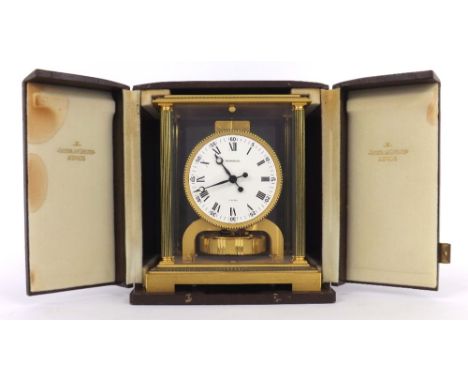 Good Jaeger LeCoultre Atmos mantel clock, the 4.5" white dial within a pillared and gadrooned stepped brass brushed case, 9.5