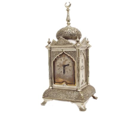 Good quality silvered two train mantel clock made for the Persian market, the French movement striking on a gong and the dial