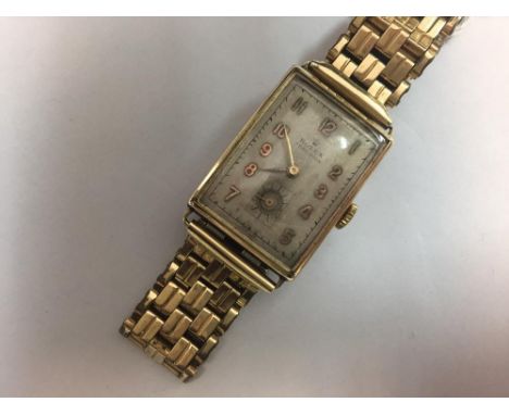 Rolex - a gentleman's 9ct gold cased 'Precision' wristwatch, the rectangular silvered dial with gold coloured Arabic numerals