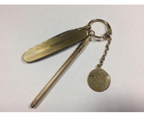 A 9ct gold swizzle stick, possibly by William Manton Ltd, Birmingham 1966,14cm (6.8gm) together with a yellow metal clad pen 