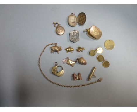 Three pigs and a collection of other quirky antique charms, the largest pig, realistically modelled, and attached to a belche