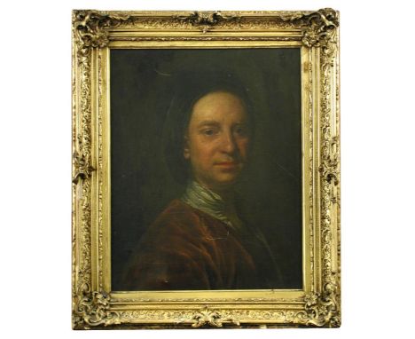 Attributed to Jonathan Richardson (British, 1665-1715) Portrait of a man, head and shoulders, in a red velvet coat and day ca