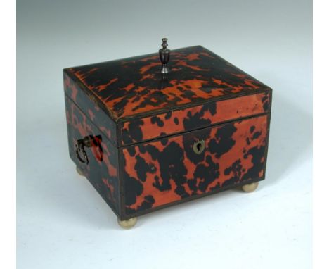 A 19th century tortoiseshell mounted box or caddy, the hinged cover with urn finial, raised on brass ball feet 15.50 x 17 x 1