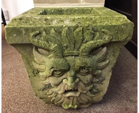 An architectural stone rain hopper, the front with carved satyr mask 36 x 34 x 28cm (14 x 13 x 11in)  