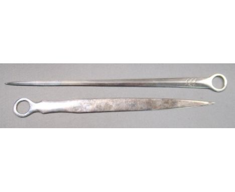 A George III silver meat skewer, by Thomas Streetin, London 1800, with ring handle, 31cm (12.25in) long, 2.72ozt; a George V 