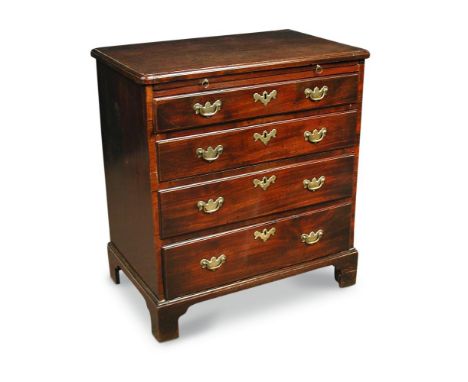 A George III mahogany chest of drawers, with brushing slide, fitted with four long graduated drawers, on bracket feet 79 x 73