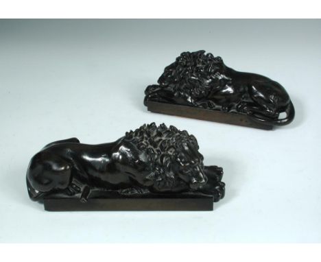After Antonio Canova (Italian, 1757-1822), a pair of patinated bronze 'Canova' lions, each of typical form, cast as recumbent