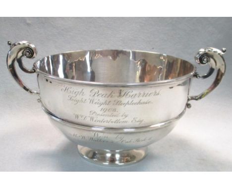 An Edwardian silver two handled trophy cup, by Thomas Bradbury & sons, London 1901, of shallow circular form with moulded gir