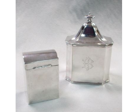 An Edwardian silver tea caddy, Sheffield 1907, of rectangular form with canted corner, engraved with initials, high domed cov