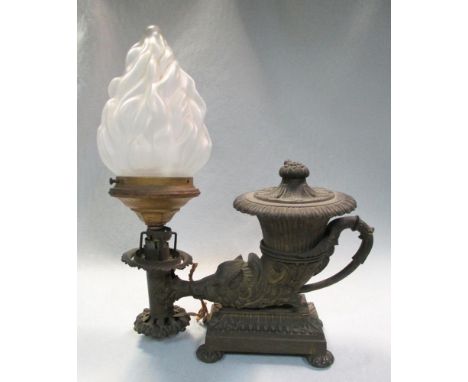 A William IV bronze colza oil lamp, the nozzle issuing from a Wild Boar's head to one end of the cornucopia shape opposite th